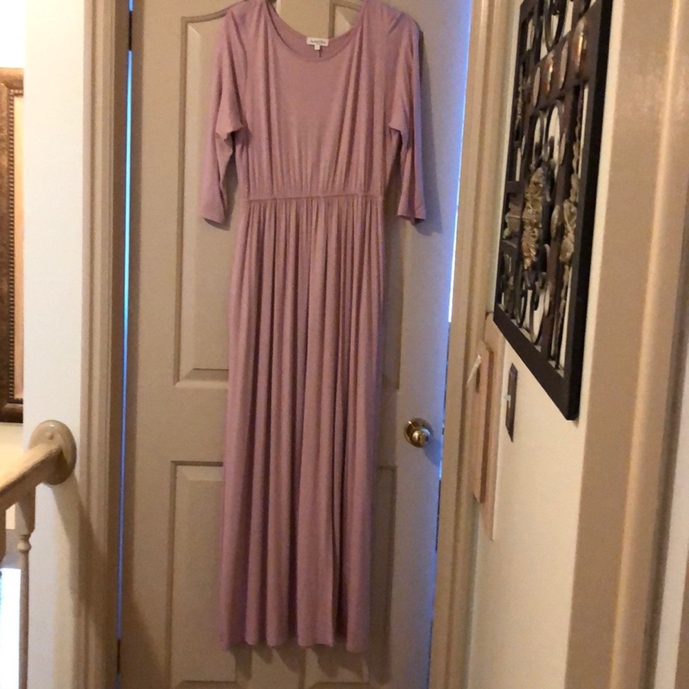 Blush Maxi Dress. Never worn. Has pockets.